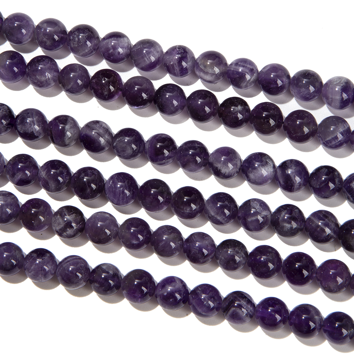 Tapered Amethyst A 10mm pearls on string