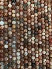 Perlas de piedra de luna Adularia multicolor A de 6mm en hilo de 40cm