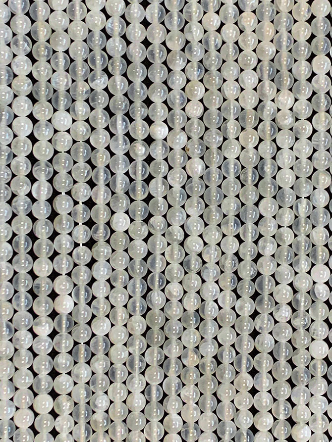 Perlas de Selenita A de 10mm en hilo de 40cm