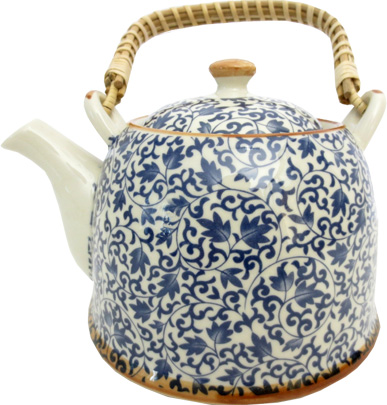 Théière bleue en porcelaine avec feuilles